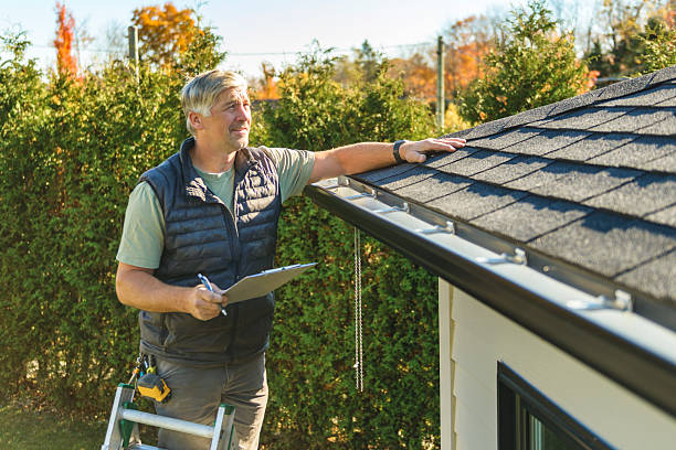 Professional Flat Roof Repair technician working in Lone Tree, IA